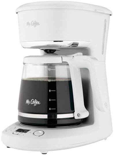 White coffee maker with glass jug full of coffee with the words mr coffee written 