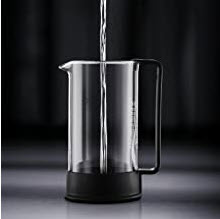 water being poured into a french press