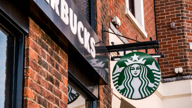 Epsom London UK, March21 2021, Starbucks Coffee Shop Branding Logo With No People