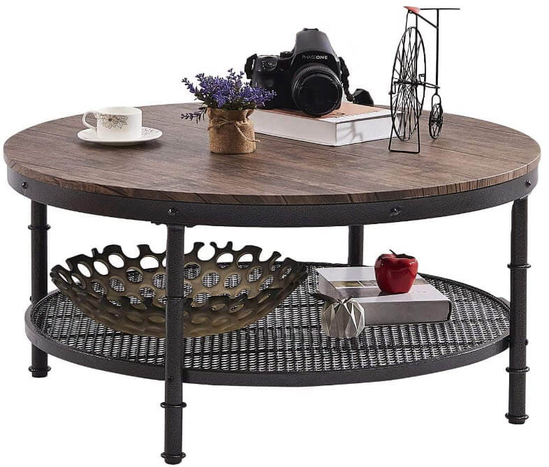 Round Walnut Coffee table with black metal frame and beautifully decorated.