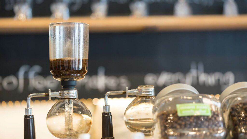 A banced syphon coffee maker setup.