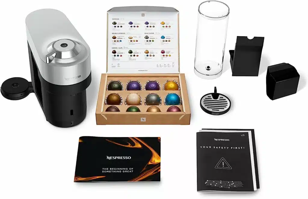 Nespresso Vertuo Pop+ Deluxe Coffee and Espresso Maker with coffee pods and instruction booklets