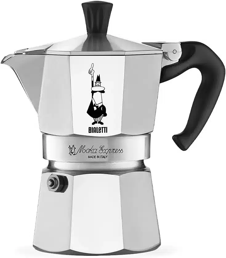 A silver coffee pot with a black handle against a white background.