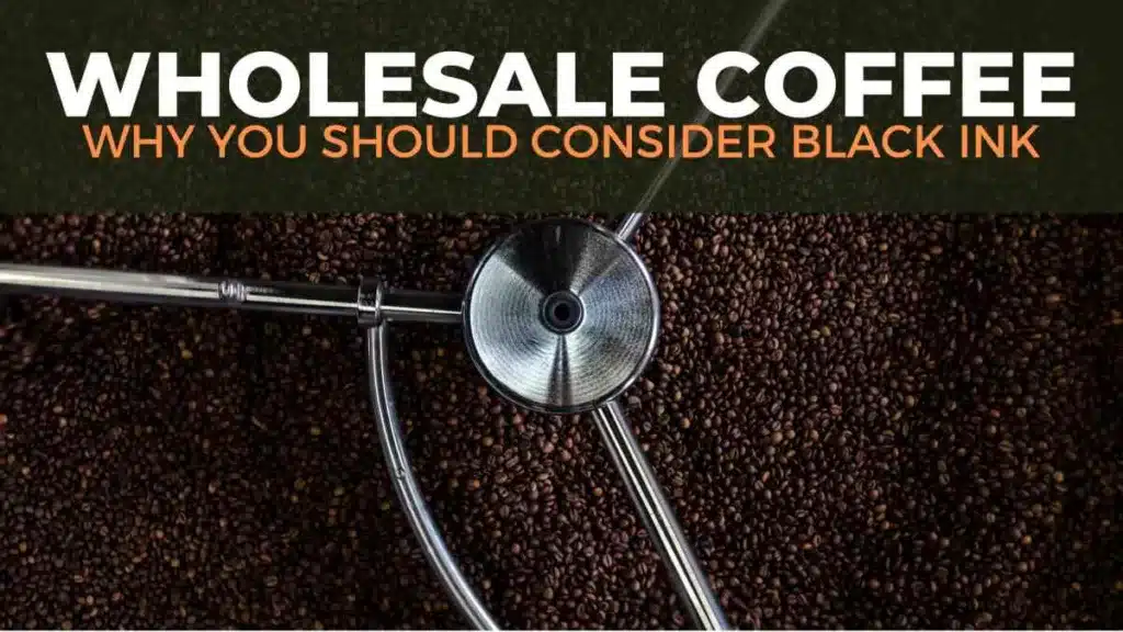 Black Ink Coffee Company advertising banner for wholesale coffee with a picture of coffee grounds in a big machine.